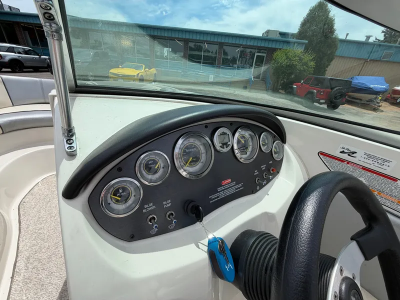 Slide: The Image of Dashboard of a 2010 Sea Ray 185 SP/SS boat. - 24