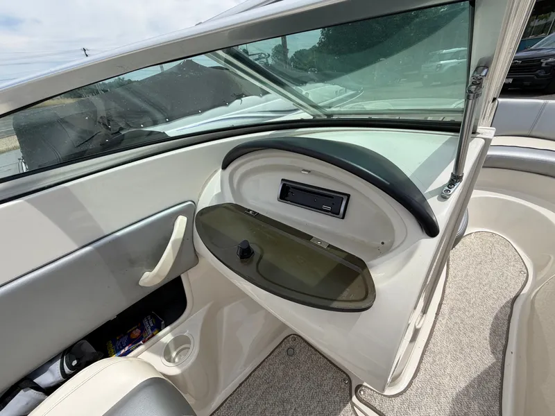 Slide: The Image of Interior view of a 2010 Sea Ray 185 SP/SS boat dashboard. - 28