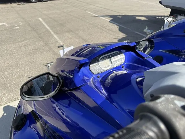 Slide: The Image of 2013 Yamaha WaveRunner VX in blue on a parking lot. - 6