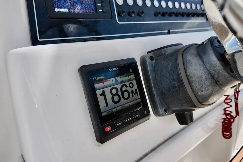 Slide: The Image of Garmin display on 2017 Sea Fox 288 Commander boat dashboard, showing 186 meters. - 10
