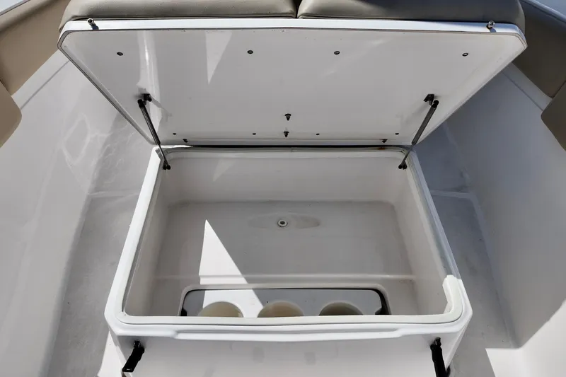 Slide: The Image of Open storage compartment on a 2017 Sea Fox 288 Commander boat. - 12