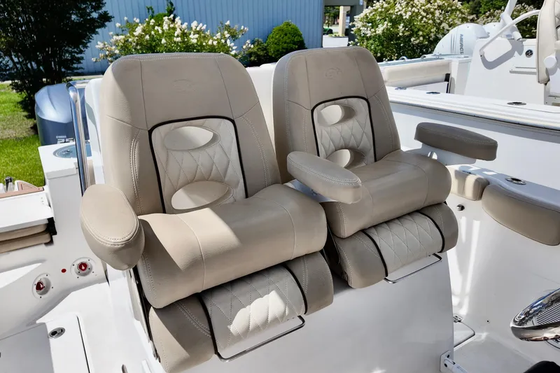 Slide: The Image of Luxurious seating on a 2017 Sea Fox 288 Commander boat, featuring plush, beige upholstery. - 15
