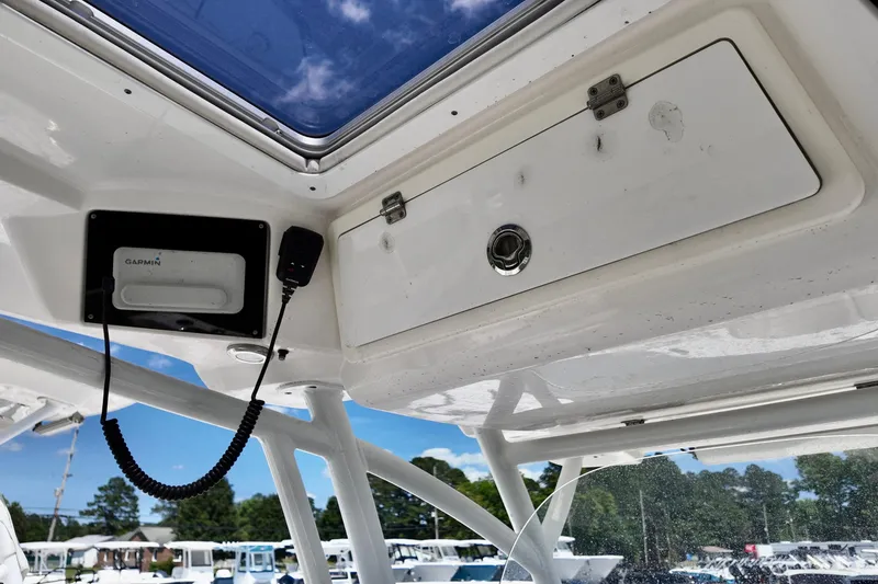 Slide: The Image of 2017 Sea Fox 288 Commander boat console with Garmin device and storage compartment. - 4
