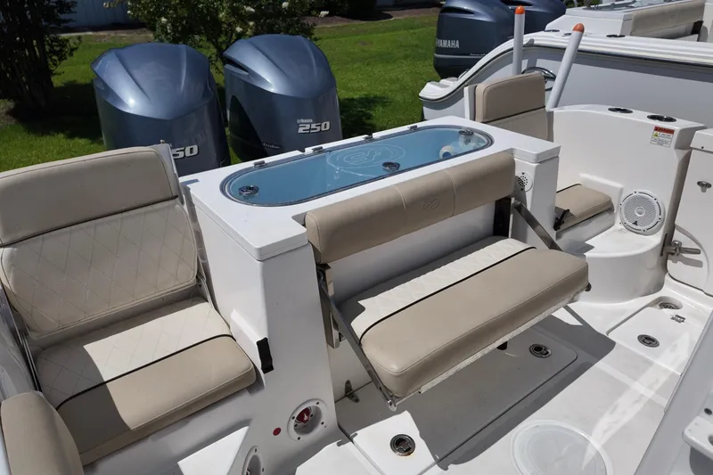Slide: The Image of 2017 Sea Fox 288 Commander boat interior with seating and Yamaha engines. - 5