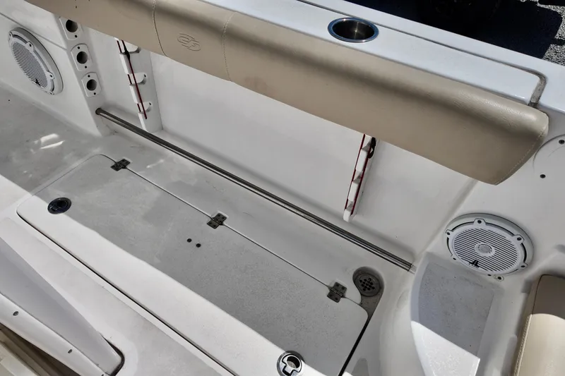 Slide: The Image of 2017 Sea Fox 288 Commander boat interior with seating, speakers, and storage compartments. - 6
