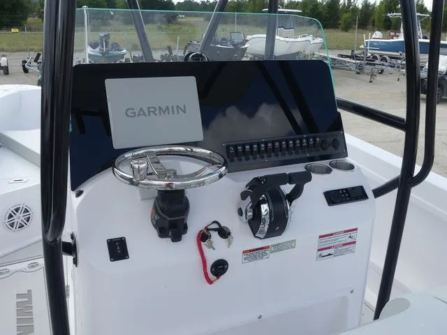Slide: The Image of Control console of Twin Vee 240 GFX2 boat, year 2027. - 14