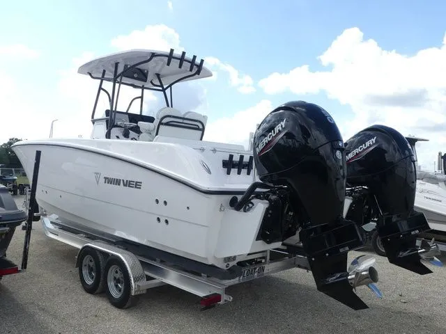 Slide: The Image of 2027 Twin Vee 240 GFX2 boat with Mercury engines on trailer. - 6
