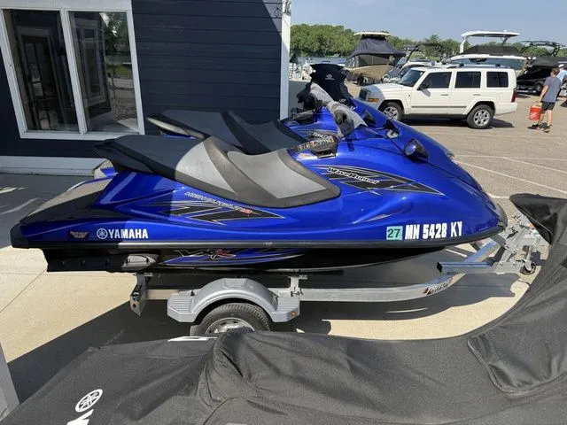 Slide: The Image of 2013 Yamaha WaveRunner VX on trailer, blue, parked outdoors. - 6