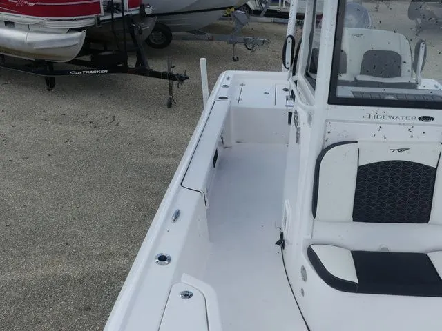 Slide: The Image of Tidewater 2410 Bay Max 2025 boat, side view on a trailer. - 15