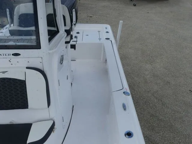 Slide: The Image of 2025 Tidewater 2410 Bay Max boat, side view on sand. - 16