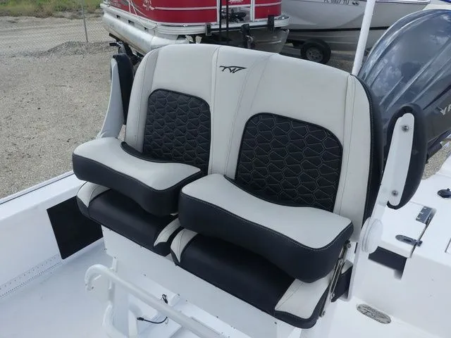 Slide: The Image of 2025 Tidewater 2410 Bay Max boat seats, black and white design. - 18