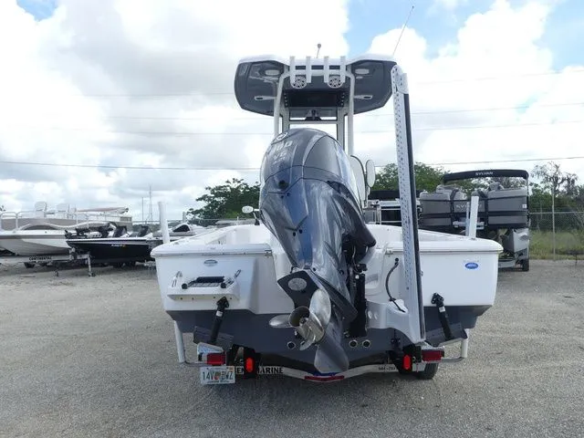 Slide: The Image of Rear view of a 2025 Tidewater 2410 Bay Max boat outdoors. - 5