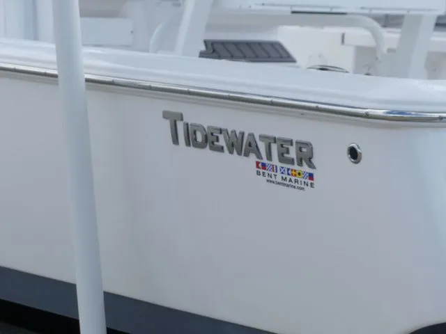 Slide: The Image of 2025 Tidewater 2410 Bay Max boat, side view with logo. - 7