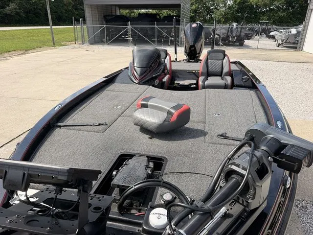 Slide: The Image of 2023 Caymas CX 21 PRO boat with gray deck and black motor. - 14