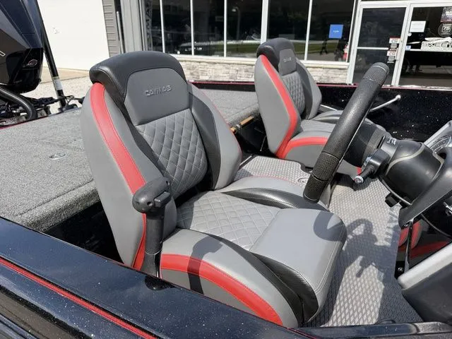 Slide: The Image of Interior of 2023 Caymas CX 21 PRO with gray and red seats. - 8