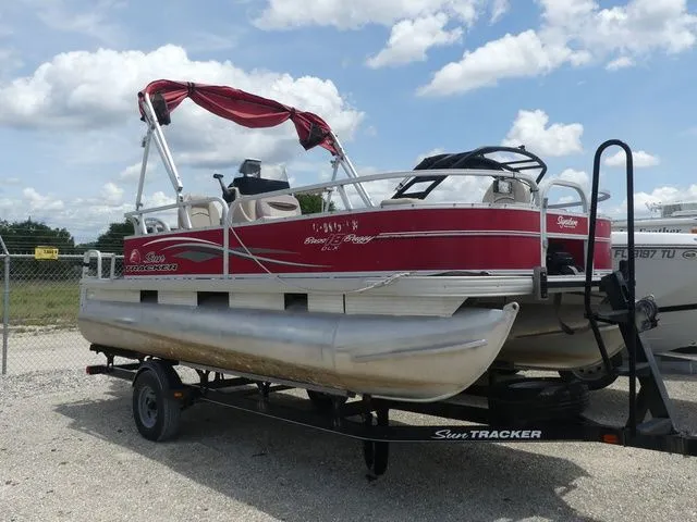 Slide: The Image of 2015 Sun Tracker Bass Buggy 18 DLX pontoon boat on trailer. - 3