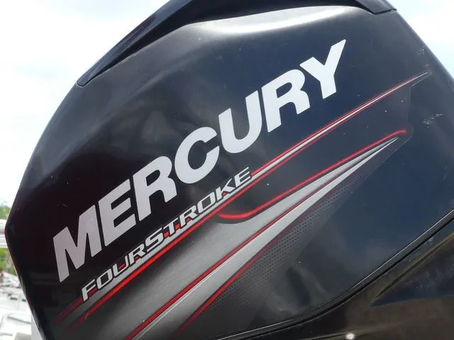 Slide: The Image of Mercury FourStroke engine on 2015 Sun Tracker Bass Buggy 18 DLX. - 9