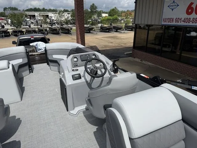 Slide: The Image of Interior of a 2026 Veranda VV 22RC pontoon boat with gray seating. - 24