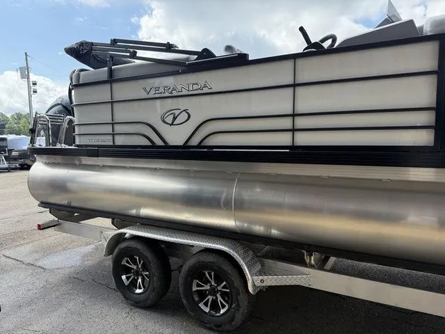 Slide: The Image of Veranda VV 22RC pontoon boat 2026 on trailer, side view. - 4