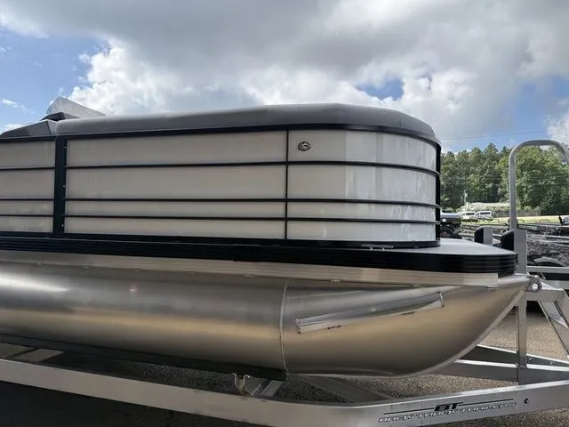 Slide: The Image of 2026 Veranda VV 22RC pontoon boat on trailer, cloudy sky. - 9