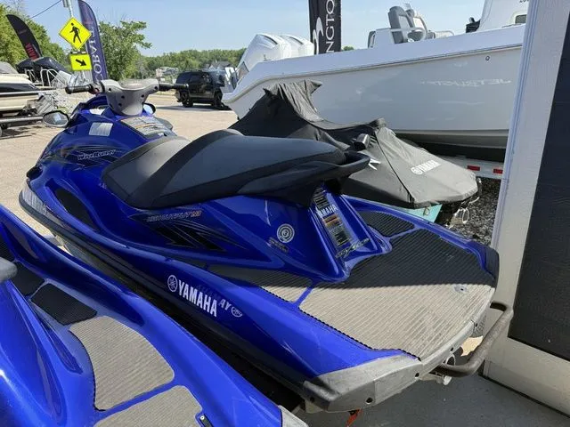 Slide: The Image of 2013 Yamaha WaveRunner VX in blue on a parking lot. - 4