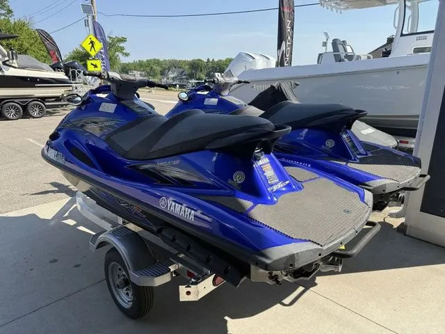 Slide: The Image of Two blue 2013 Yamaha WaveRunner VX jet skis on a trailer. - 3