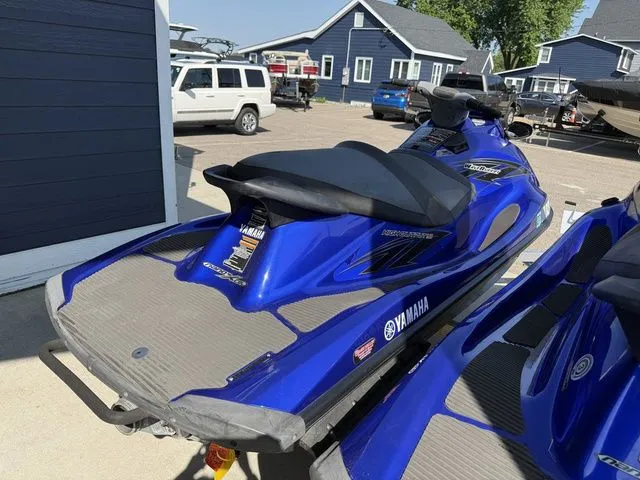 Slide: The Image of 2013 Yamaha WaveRunner VX in blue parked outdoors. - 5