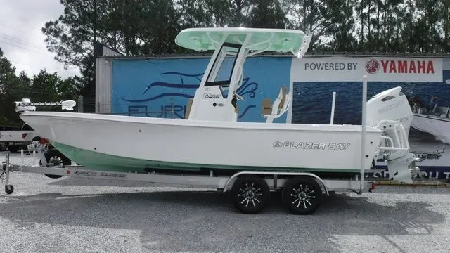 The Image of 2026 Blazer Bay 2440 boat on trailer, side view. - 1