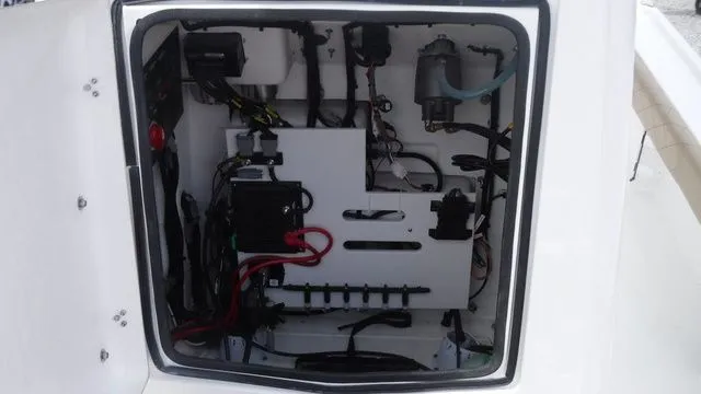 Slide: The Image of Electrical compartment of Blazer Bay 2440 boat, year 2026. - 10