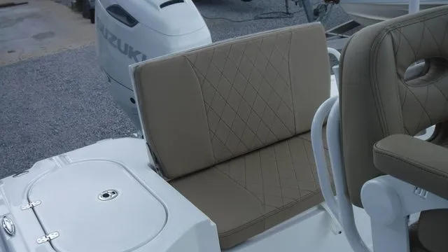 Slide: The Image of 2026 Blazer Bay 2440 boat with Suzuki engine and cushioned seats. - 15