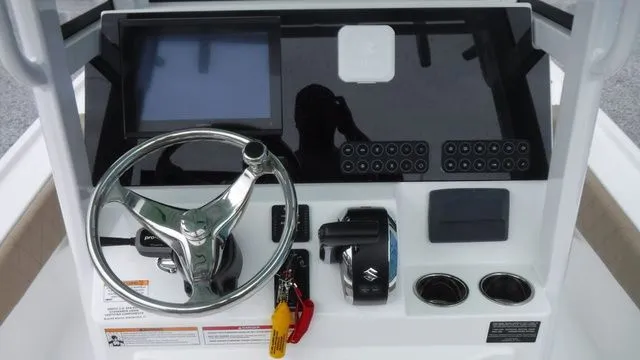 Slide: The Image of Dashboard of Blazer Bay 2440 boat, model year 2026. - 17