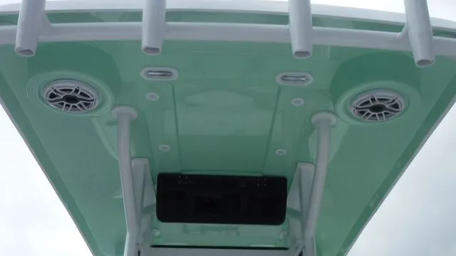 Slide: The Image of Blazer Bay 2440 2026 boat roof with speakers and mounts. - 20