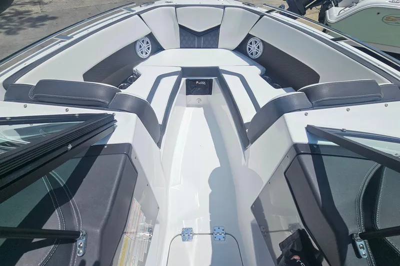Slide: The Image of 2024 Monterey 215SS Super Sport boat interior with sleek seating and modern design. - 14