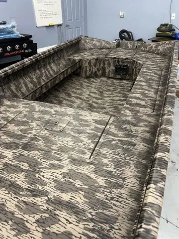 Slide: The Image of 2026 Reaper 756 Timber Reaper boat with camouflage interior design. - 6