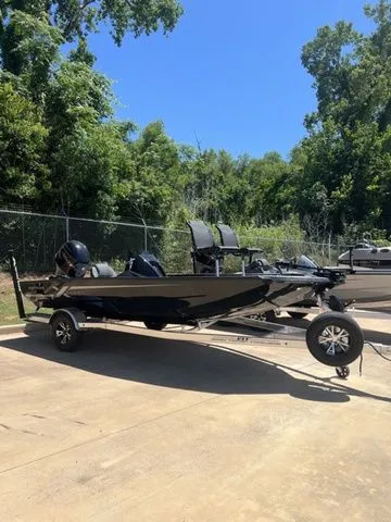 The Image of 2026 Xpress Boats HYPER-LIFT H18C parked on trailer outdoors. - 1