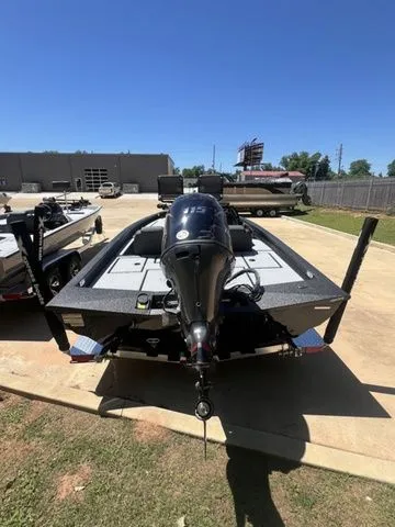 Slide: The Image of 2026 Xpress Boats HYPER-LIFT H18C in a parking lot. - 10