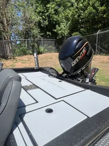 Slide: The Image of 2026 Xpress Boats HYPER-LIFT H18C with powerful outboard motor. - 8