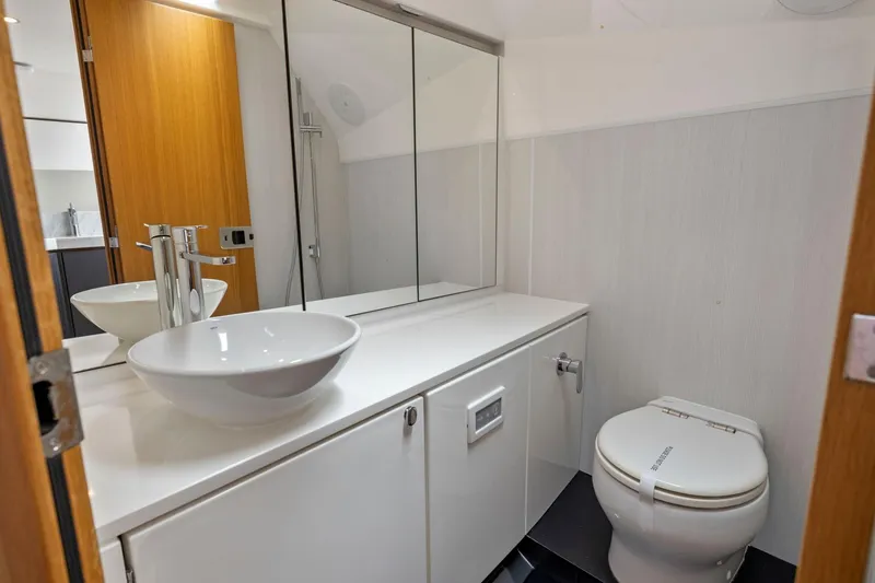 Slide: The Image of Modern bathroom interior of 2023 Fairline F//Line 33 Outboard yacht, featuring sleek design elements. - 65