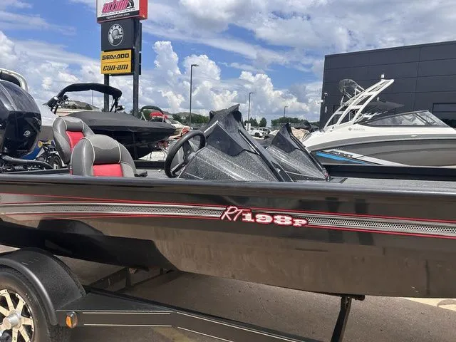 Slide: The Image of 2019 Ranger RT198P boat on a trailer at a dealership. - 3