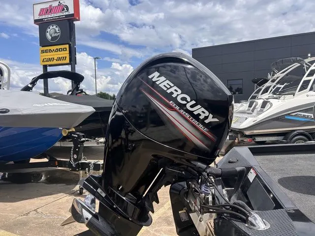 Slide: The Image of 2019 Ranger RT198P with Mercury outboard motor in parking lot. - 7