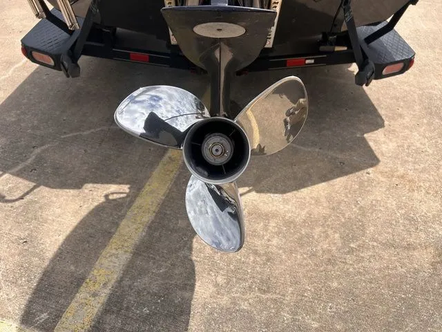 Slide: The Image of Close-up of a 2019 Ranger RT198P boat propeller on concrete. - 8