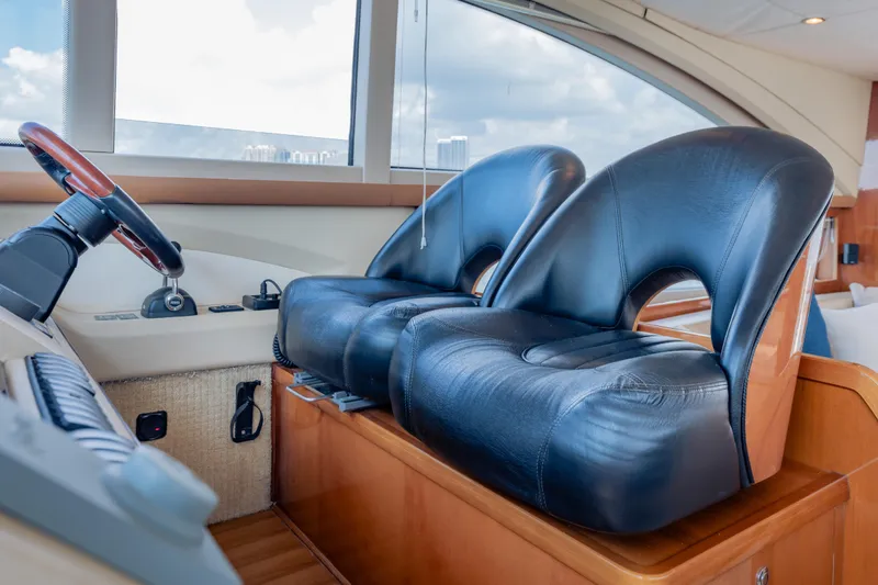 Slide: The Image of Luxurious leather seats in the helm of a 2009 Princess 54 Flybridge yacht. - 45