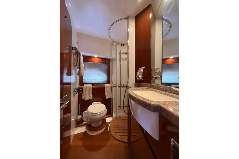 Slide: The Image of Luxurious bathroom in 2009 Princess 54 Flybridge yacht with modern fixtures and elegant design. - 20