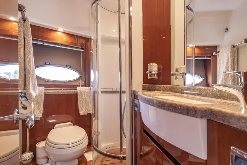 Slide: The Image of Luxurious bathroom in 2009 Princess 54 Flybridge yacht with modern fixtures and elegant design. - 62
