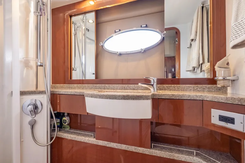 Slide: The Image of Luxurious bathroom interior of 2009 Princess 54 Flybridge yacht with modern fixtures and elegant design. - 60