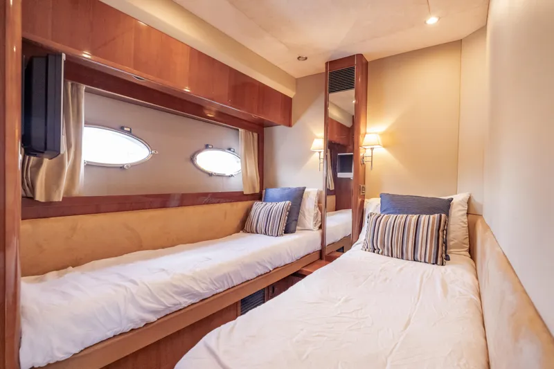 Slide: The Image of Luxurious twin cabin interior of 2009 Princess 54 Flybridge yacht. - 61