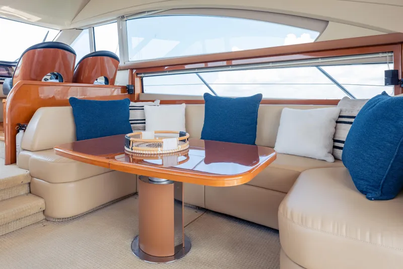 Slide: The Image of Luxurious interior of 2009 Princess 54 Flybridge yacht with plush seating and cushions. - 39