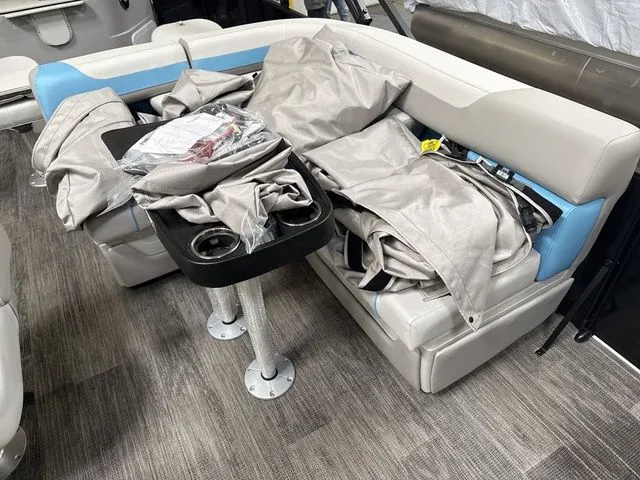 Slide: The Image of Interior of Godfrey Pontoons Sweetwater 2286 FS 2026 with seating area and table. - 10