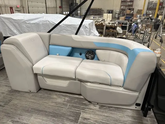 Slide: The Image of Interior of Godfrey Pontoons Sweetwater 2286 FS 2026 with blue accents. - 3