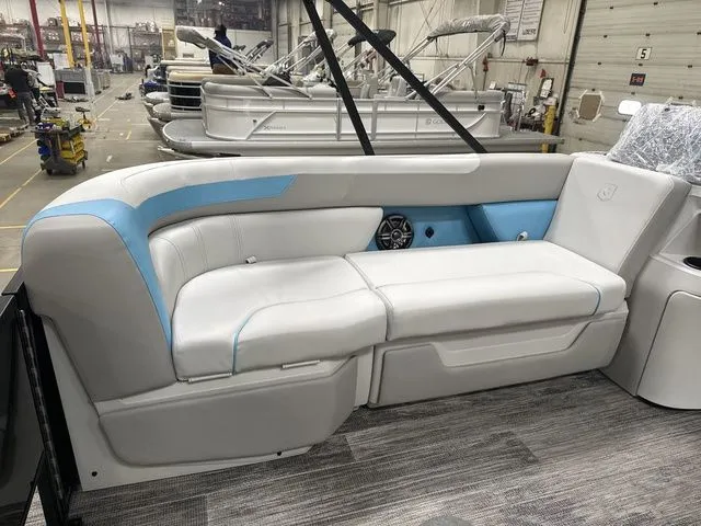 Slide: The Image of Interior of 2026 Godfrey Pontoons Sweetwater 2286 FS with white and blue seating. - 4